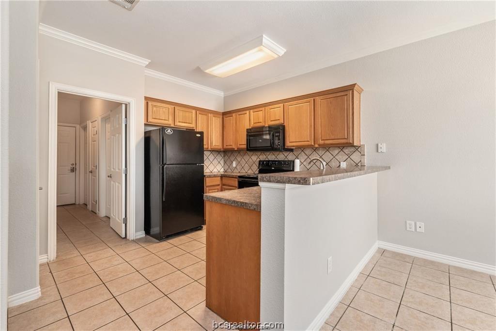 1001 Krenek Tap Road, Unit 2105 College Station, TX 77840 - Photo 7 of 24 Eating bar seating for casual meals