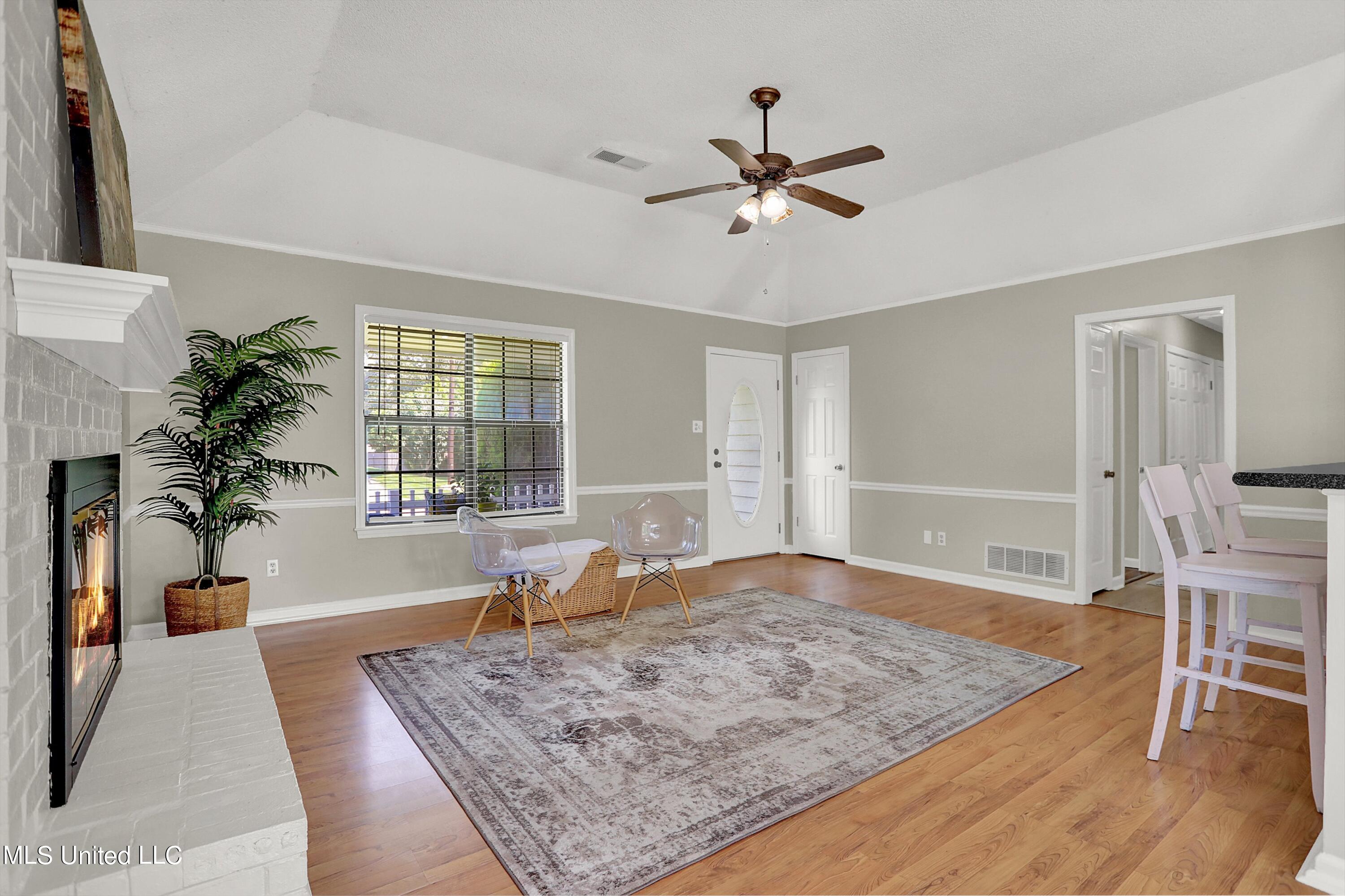 10051 Goodman Road Olive Branch, MS 38654 - Photo 7 of 30 Raised brick hearth