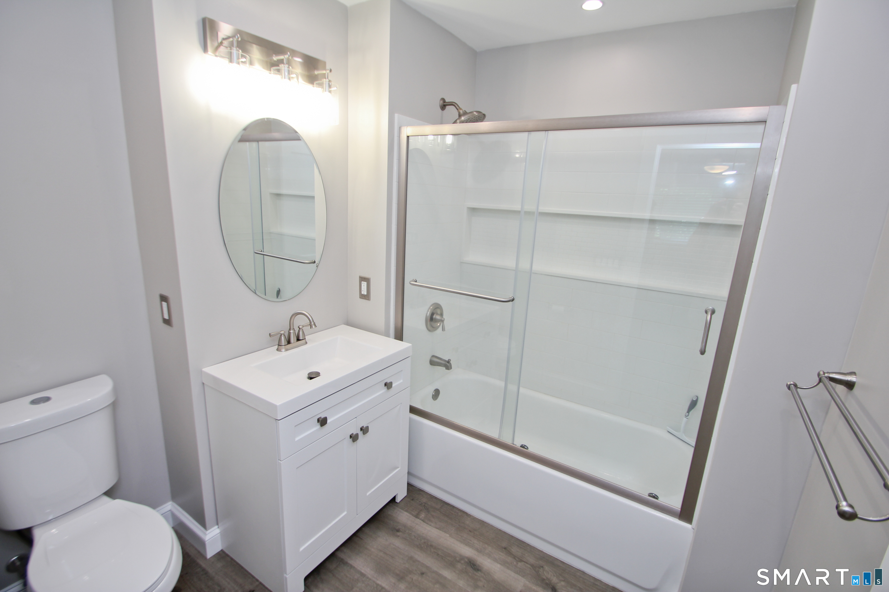 5 R Broad Hill Road Granby, CT 06090 - Photo 12 of 31 a bathroom with a sink a toilet and a mirror