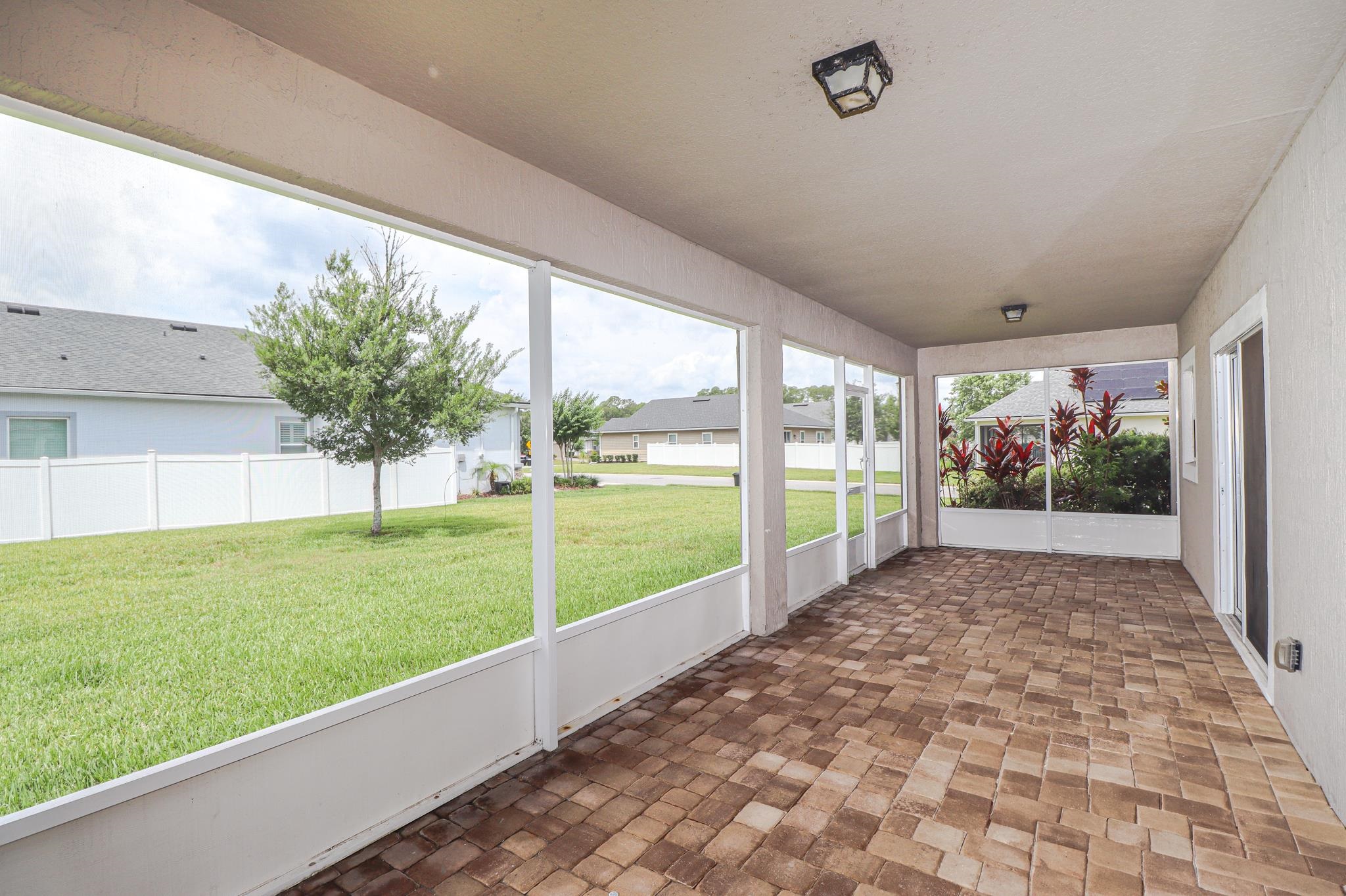 554 Tumbled Stone Way St. Augustine, FL 32086 - Photo 14 of 44 a view of porch with a garden