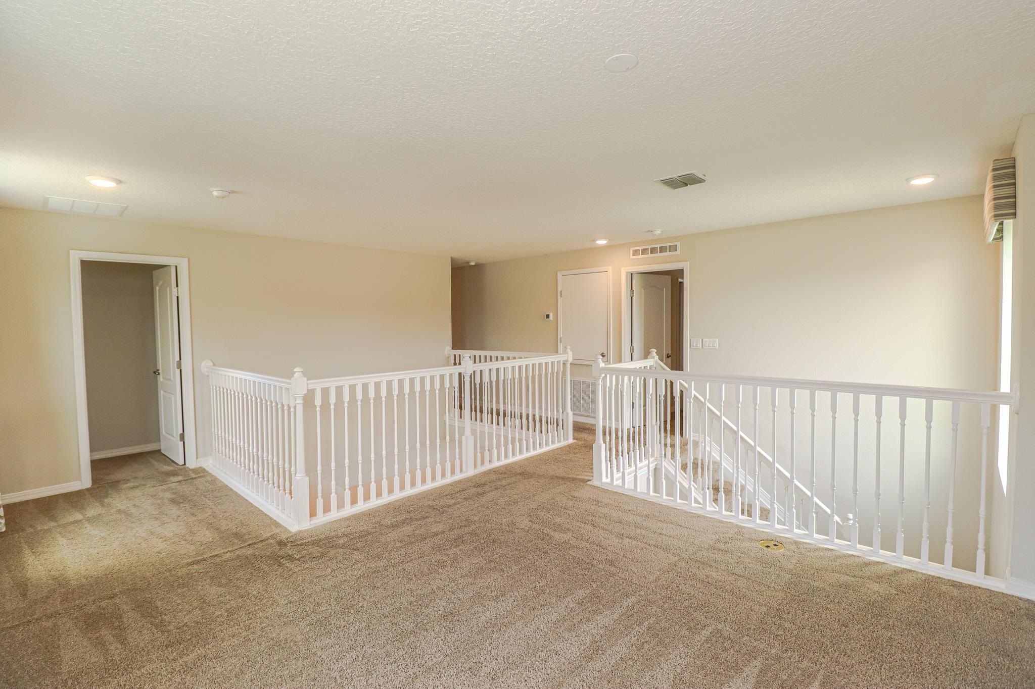 554 Tumbled Stone Way St. Augustine, FL 32086 - Photo 17 of 44 a view of a hallway