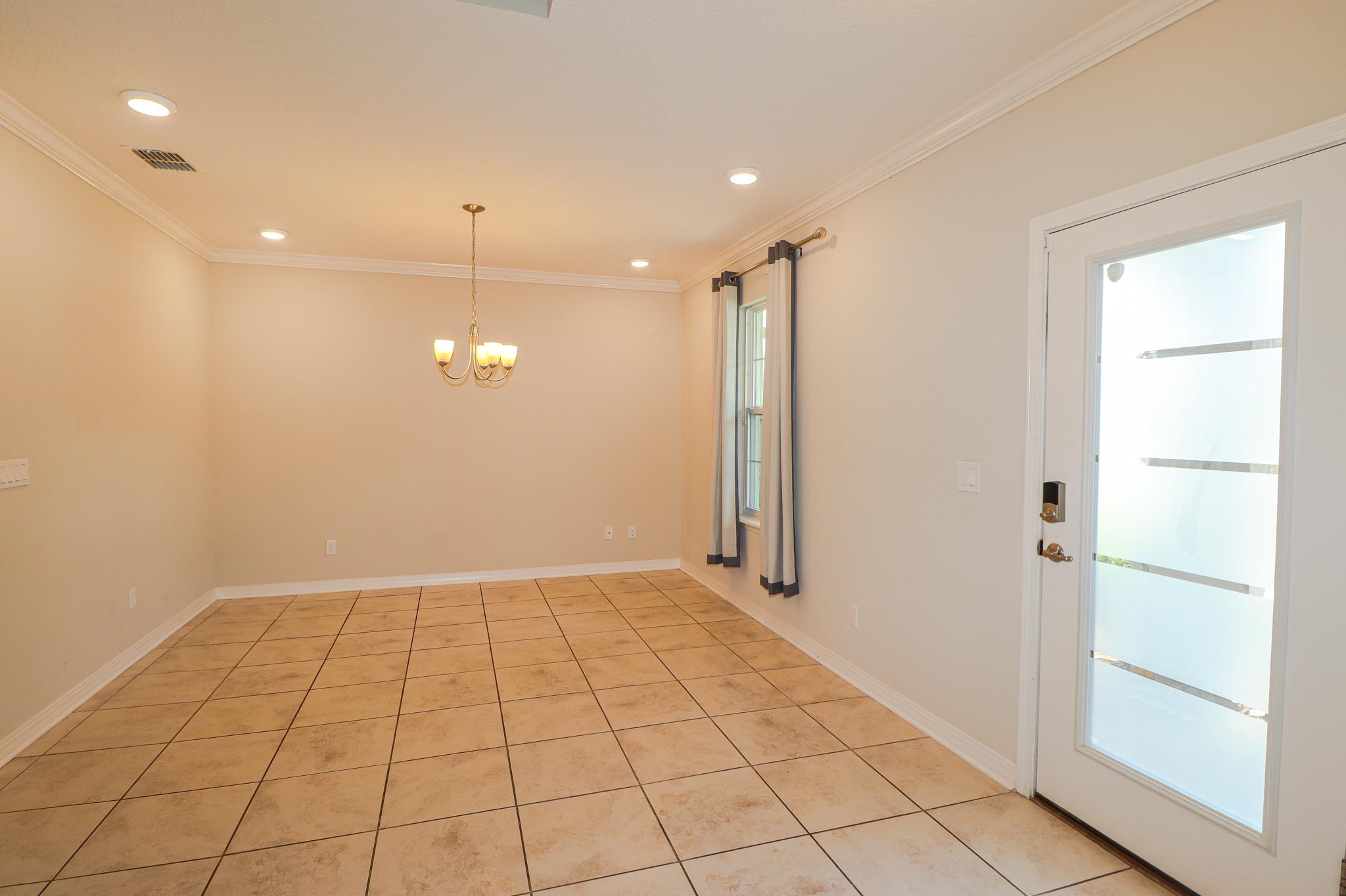 554 Tumbled Stone Way St. Augustine, FL 32086 - Photo 2 of 44 a view of an empty room