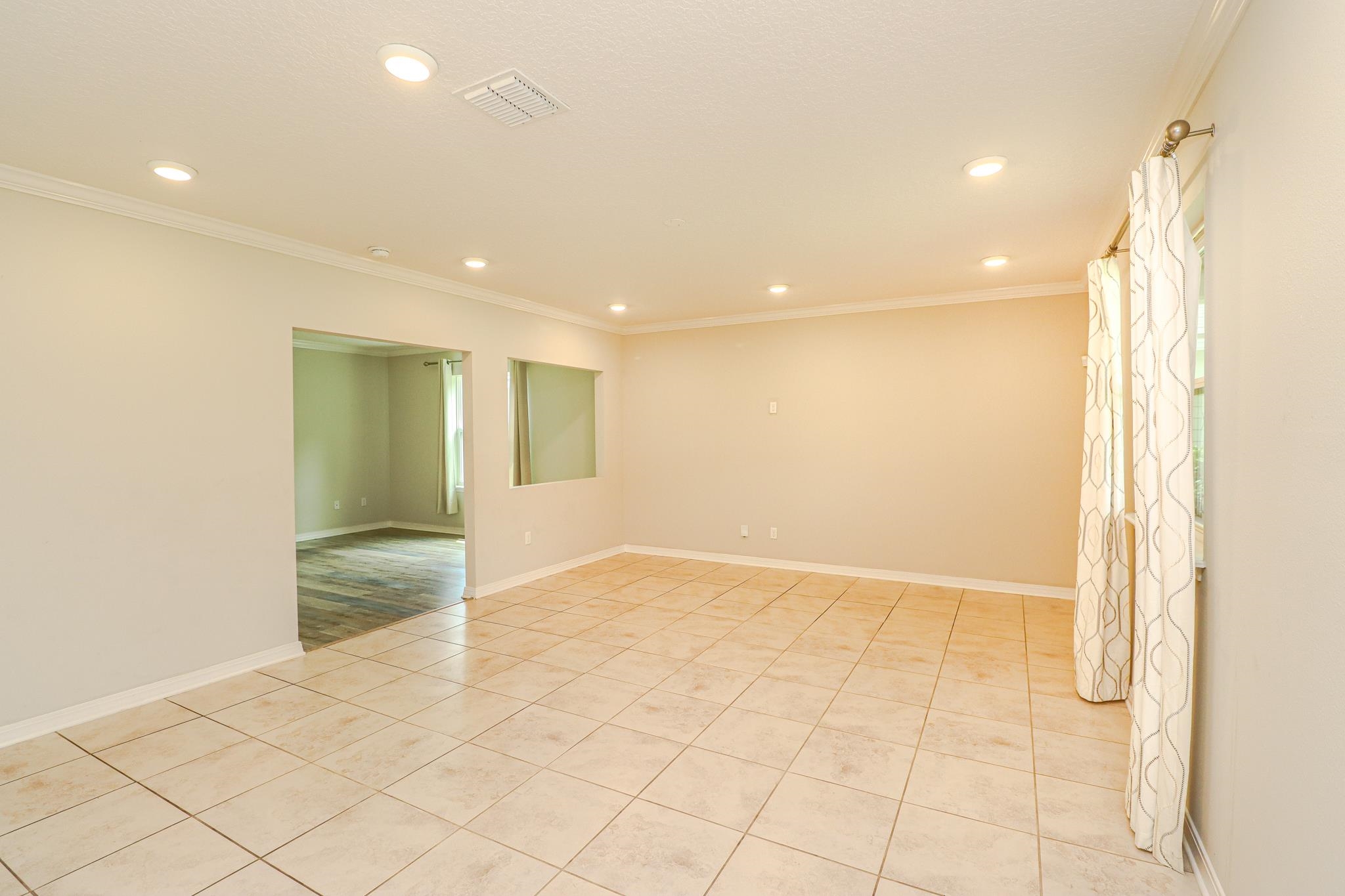554 Tumbled Stone Way St. Augustine, FL 32086 - Photo 9 of 44 a view of an empty room