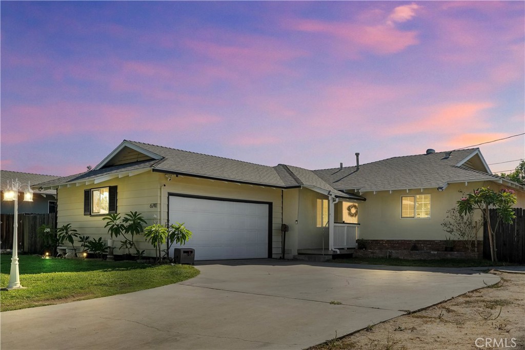 6741 Montclair Drive Riverside, CA 92504 - Photo 1 of 1 a front view of a house with garden