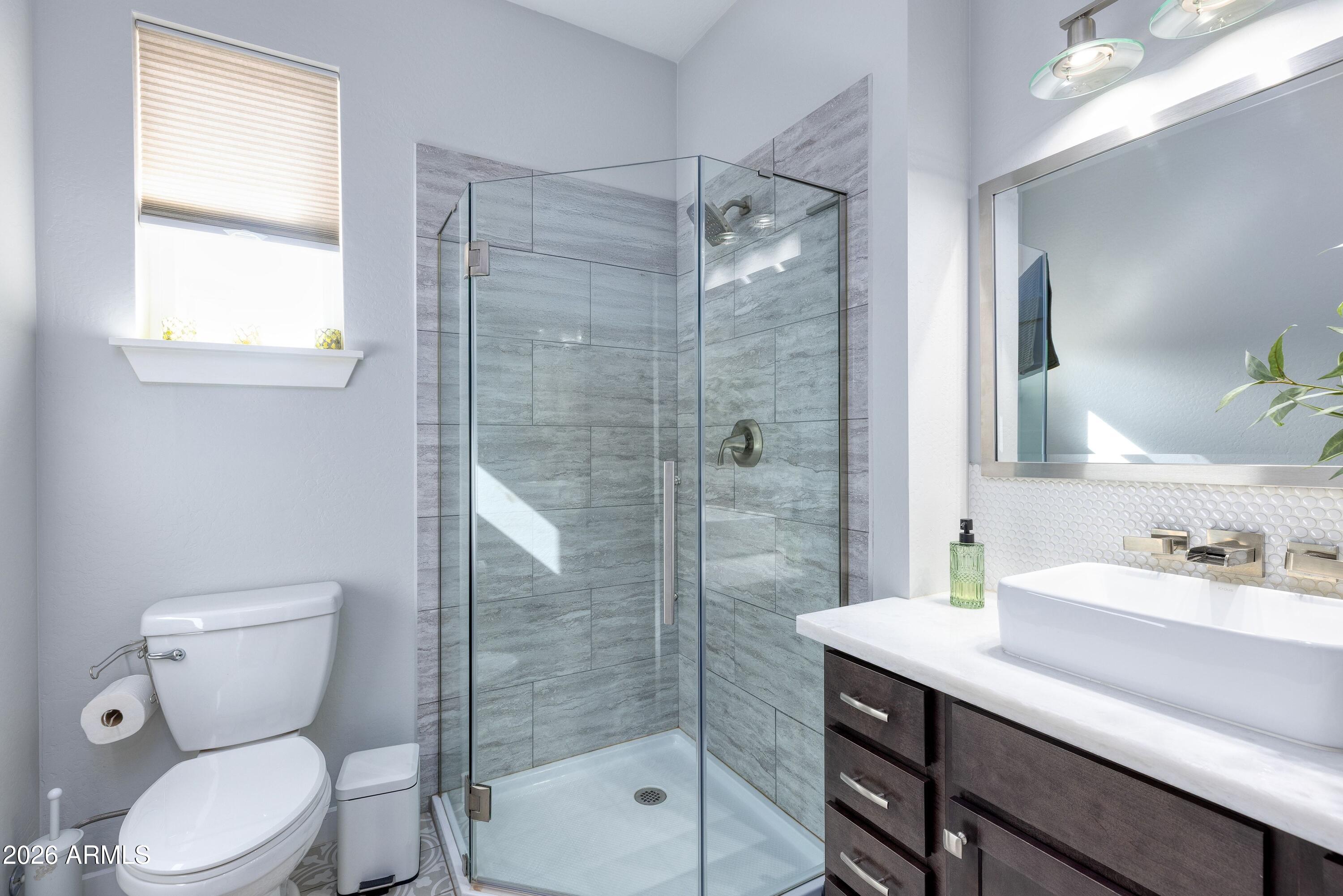 1898 Rocky Lane Show Low, AZ 85901 - Photo 25 of 59 a bathroom with a sink toilet and shower