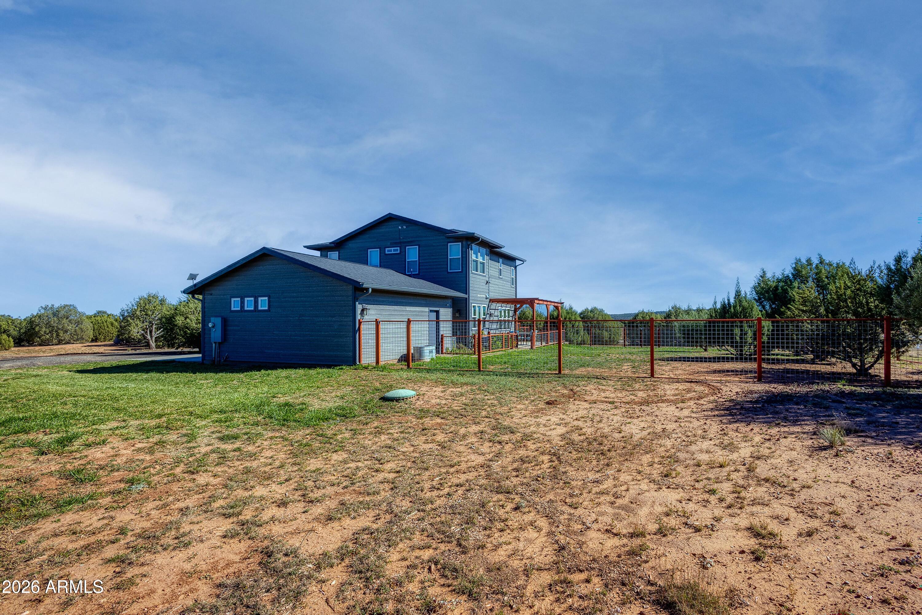 1898 Rocky Lane Show Low, AZ 85901 - Photo 35 of 59 a house view with a backyard space