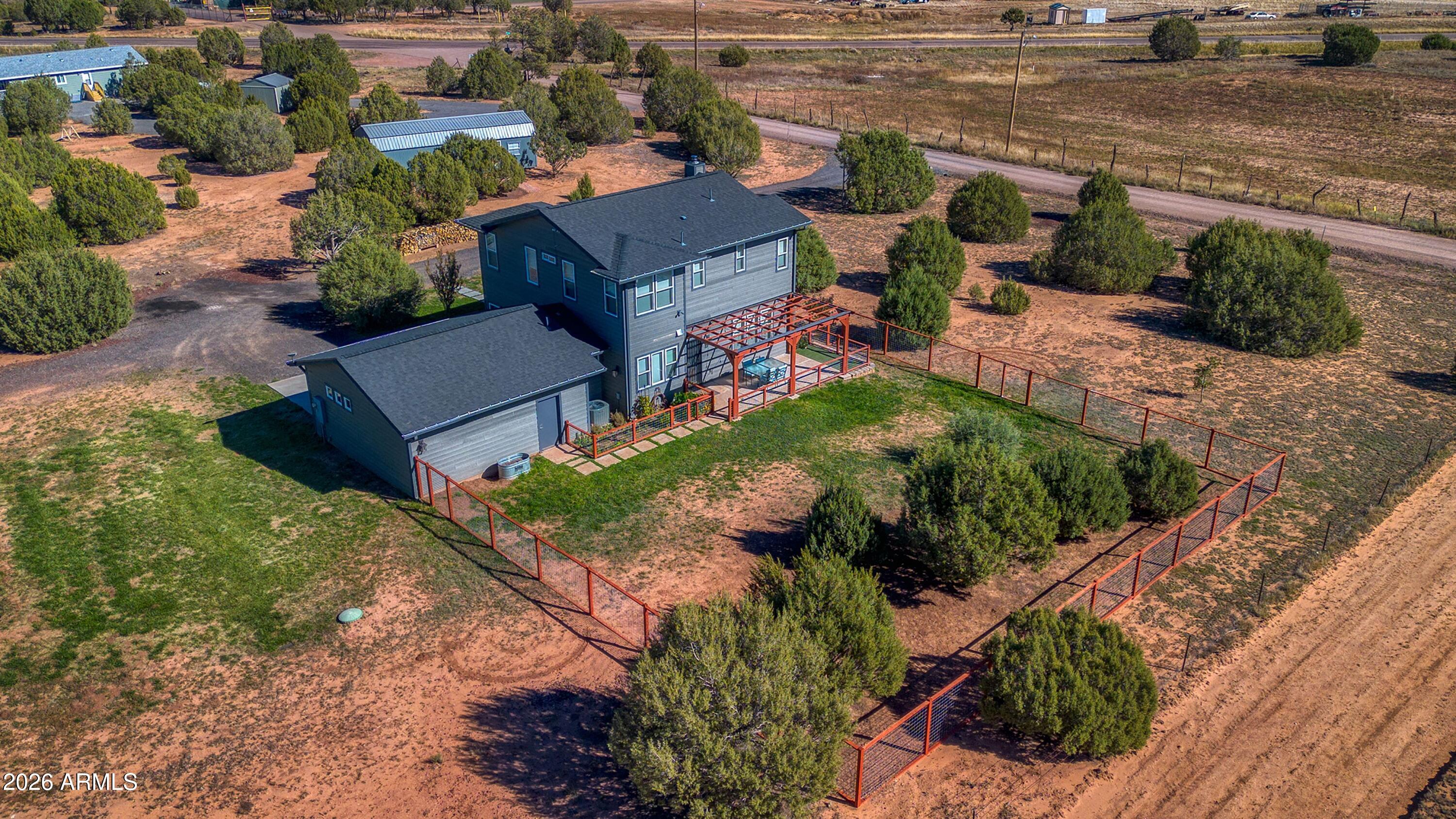 1898 Rocky Lane Show Low, AZ 85901 - Photo 43 of 59 an aerial view of a house with a yard basket ball court and outdoor seating