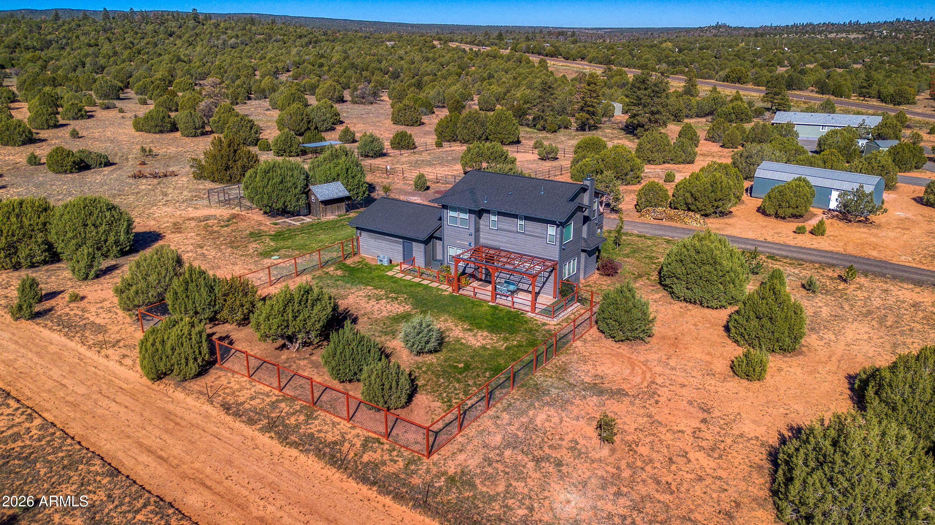 1898 Rocky Lane Show Low, AZ 85901 - Photo 44 of 59 an aerial view of residential houses with outdoor space