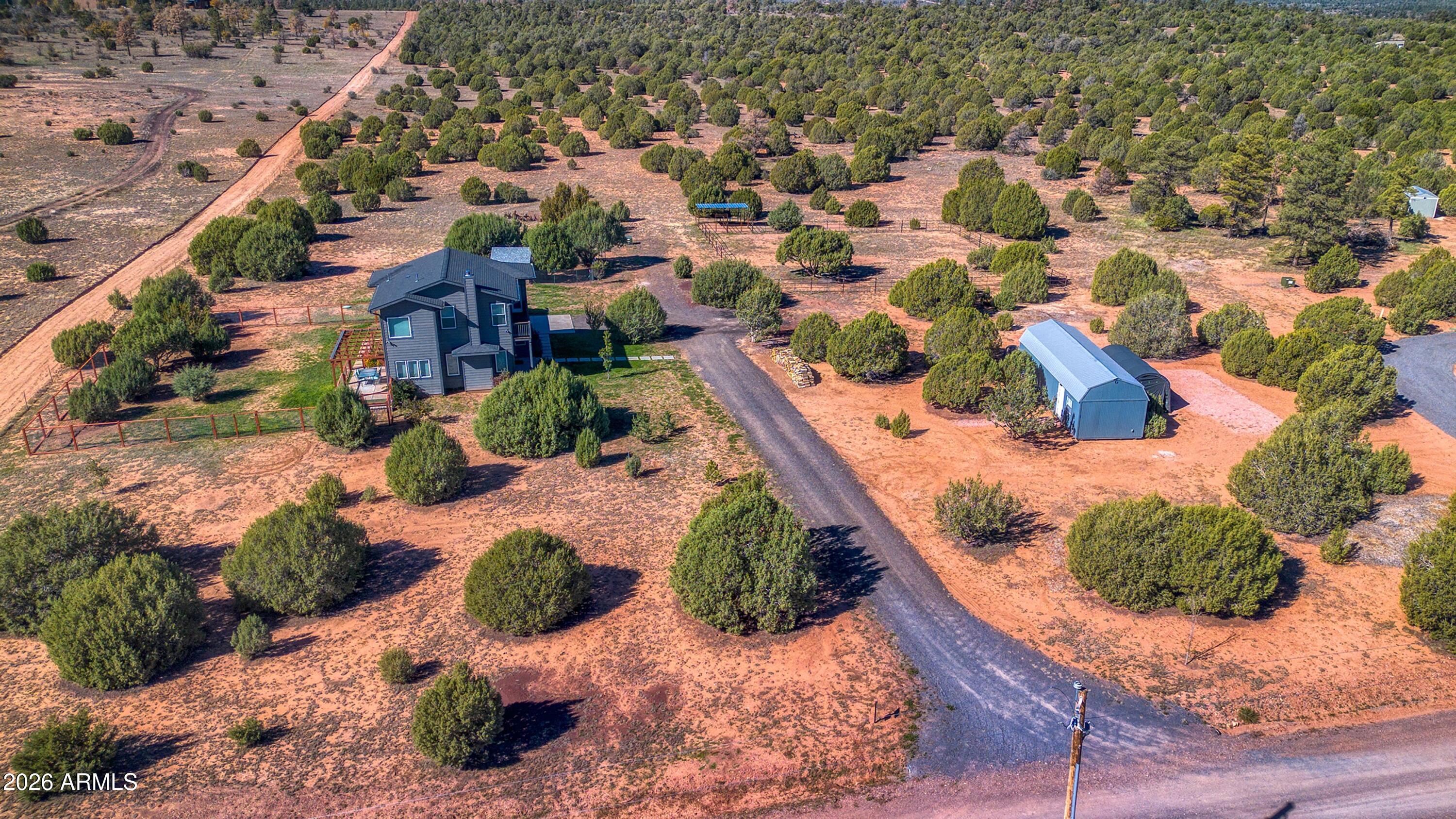 1898 Rocky Lane Show Low, AZ 85901 - Photo 49 of 59 an aerial view of residential houses with outdoor space