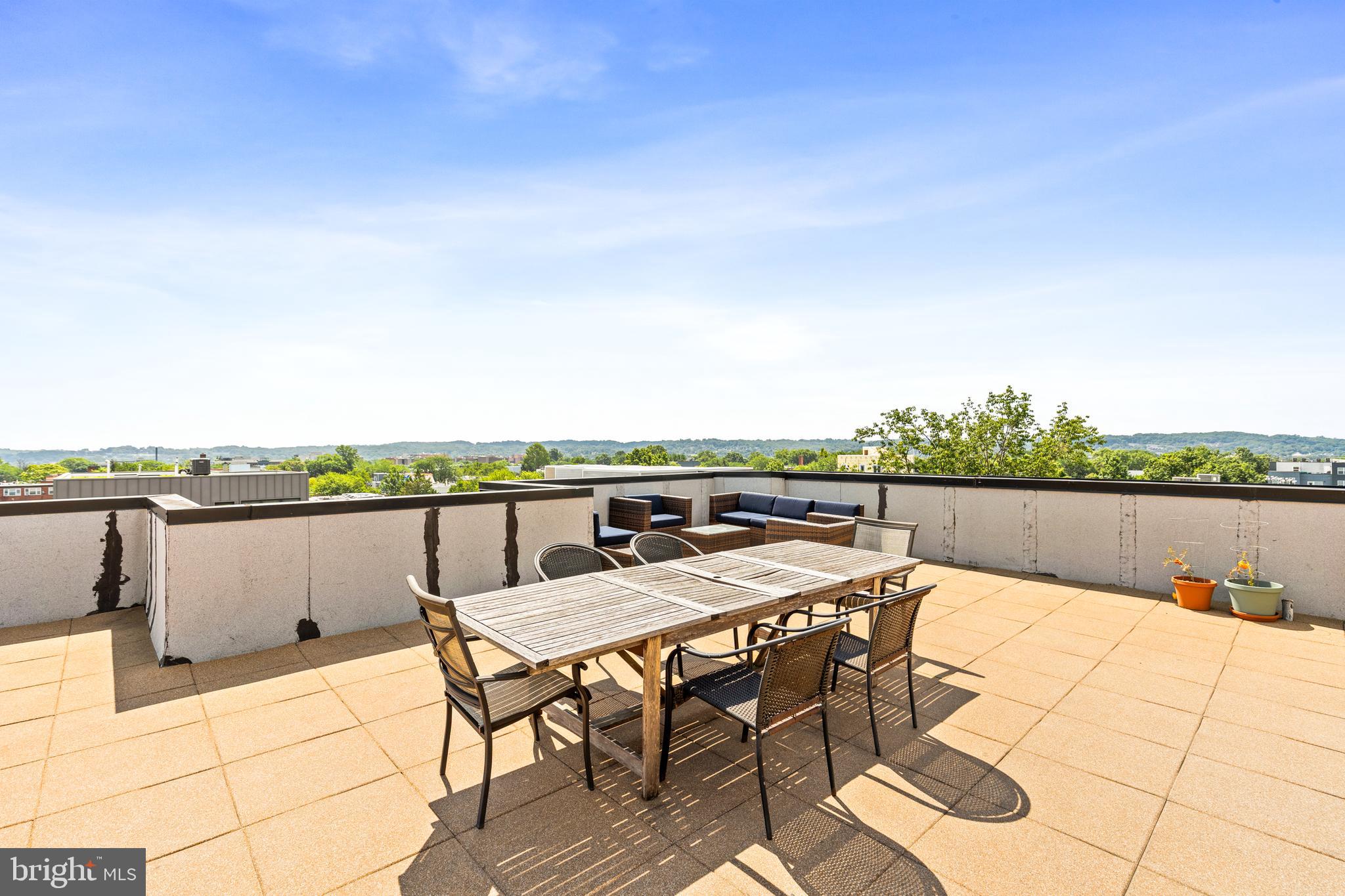 245 15th Street Southeast, Unit 105 Washington, DC 20003 - Photo 21 of 29 a view of a terrace with sitting area
