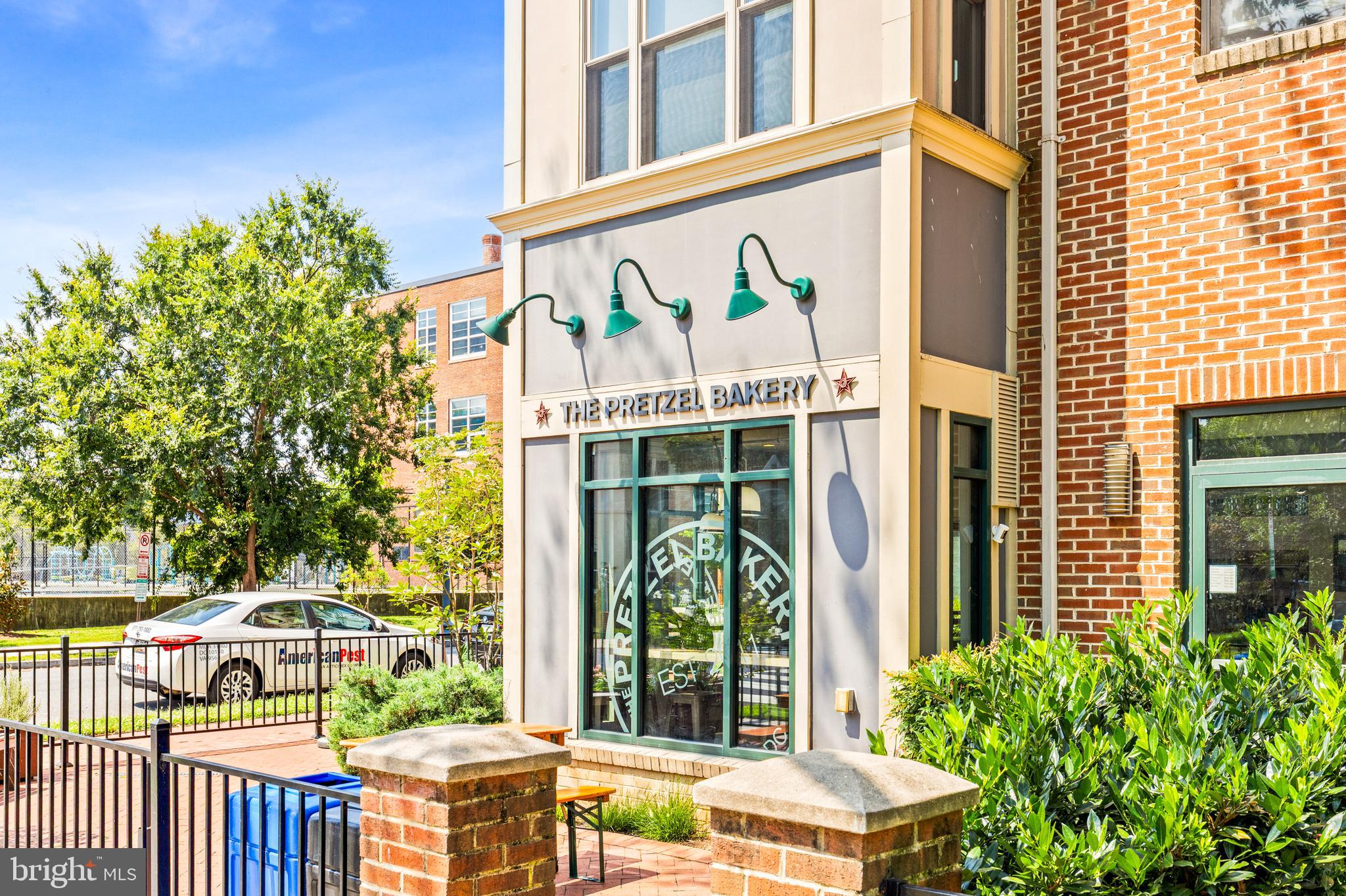 245 15th Street Southeast, Unit 105 Washington, DC 20003 - Photo 28 of 29 a front view of a house with a yard