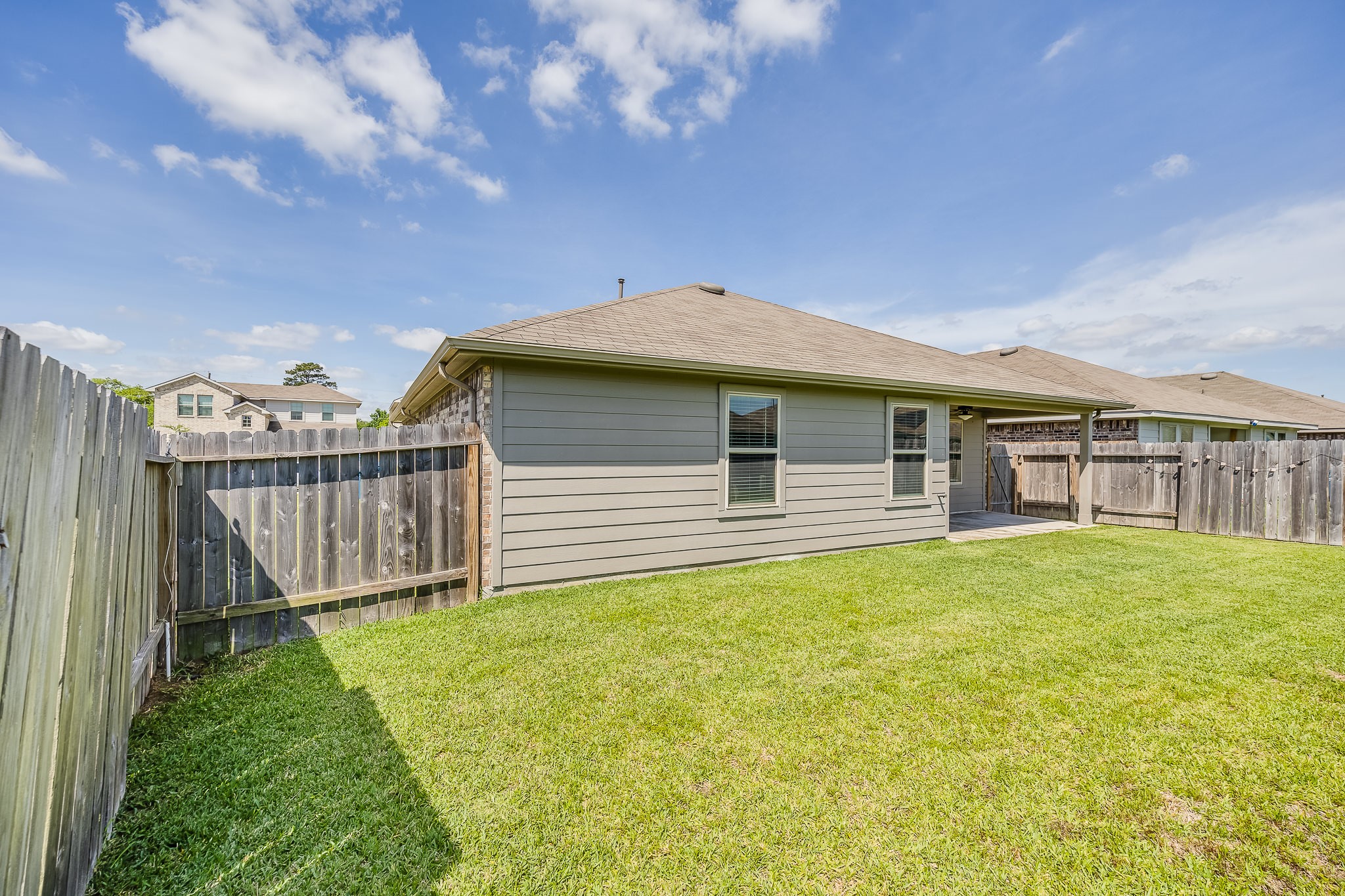 23210 Barberry Crk Trail Spring, TX 77373 - Photo 22 of 33 a front view of a house with a garden