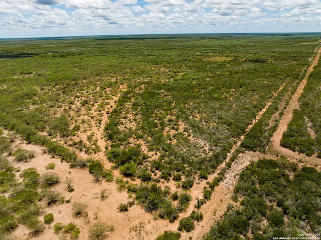 a view of a road with a mountain in the background