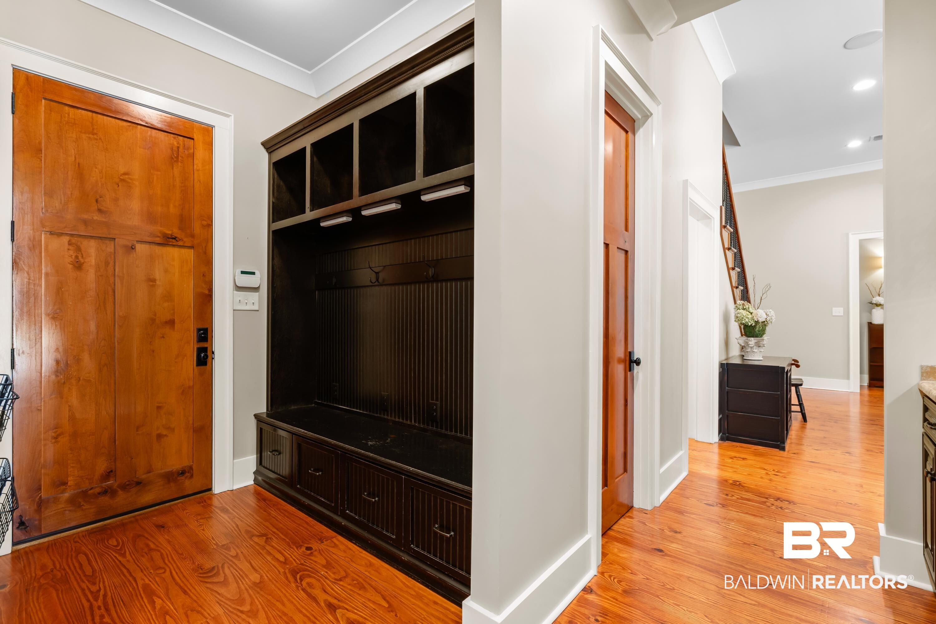 30057 Dolive Ridge Daphne, AL 36527 - Photo 18 of 55 Mudroom featuring light wood-type flooring and crown molding