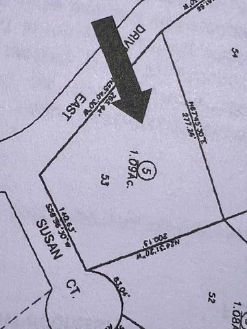 a close up of a utility room with washer and dryer