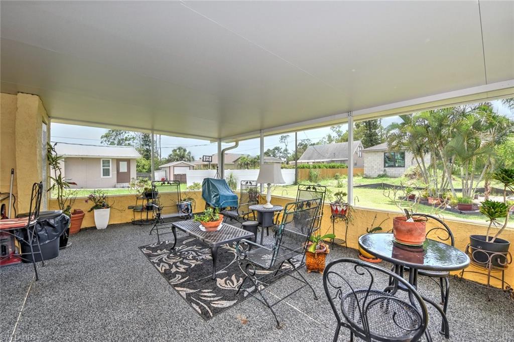 19066 Flamingo Road Fort Myers, FL 33967 - Photo 13 of 29 a room with lots of tables and chairs