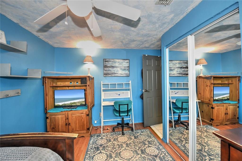 19066 Flamingo Road Fort Myers, FL 33967 - Photo 19 of 29 a bedroom with furniture and window
