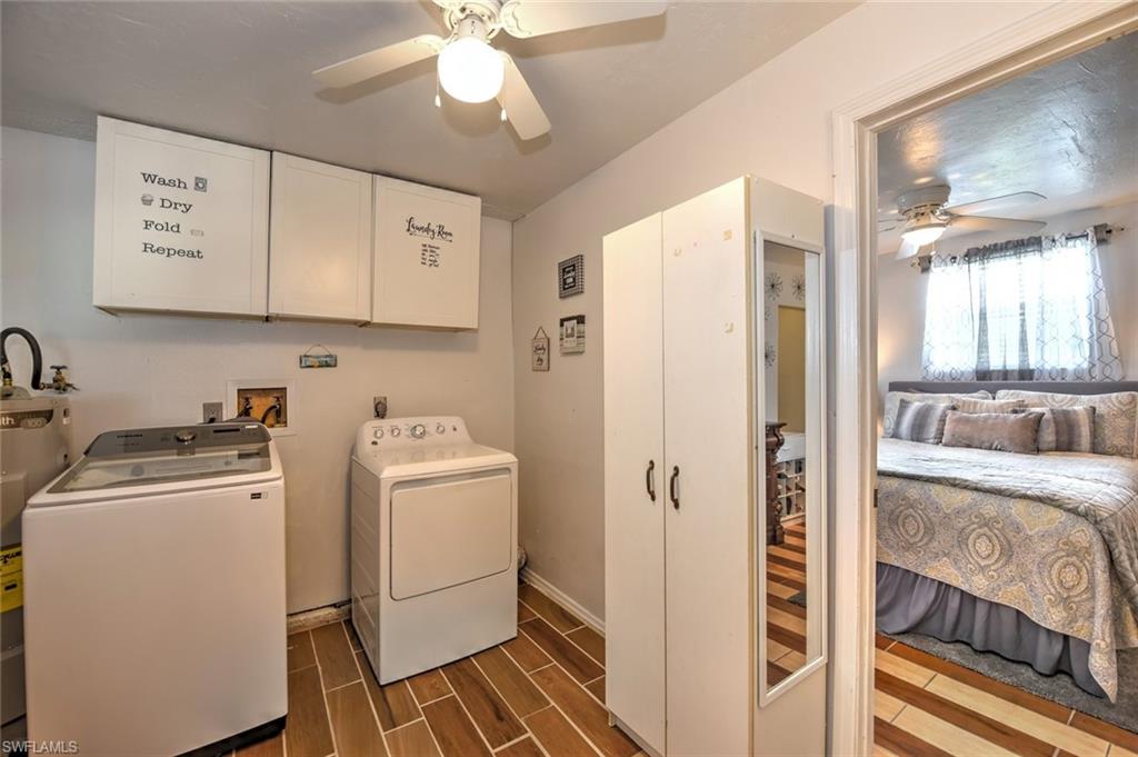 19066 Flamingo Road Fort Myers, FL 33967 - Photo 24 of 29 a room with a bed and a refrigerator