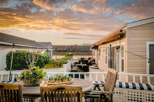 a view of balcony with furniture