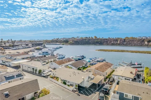 a view of a lake with multiple houses