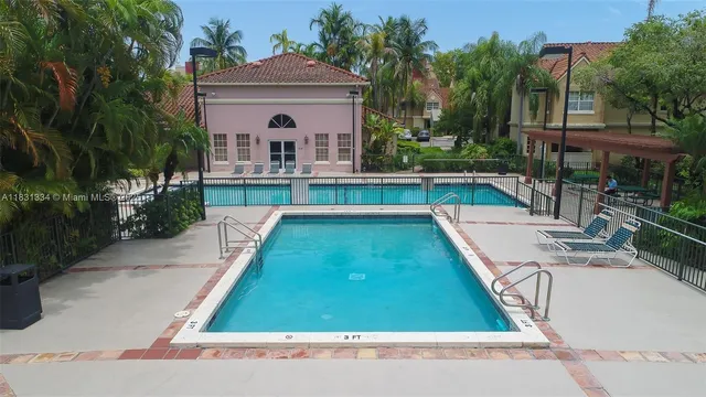 a view of swimming pool with a patio