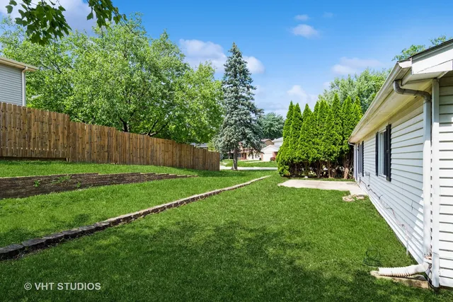 a view of a backyard with a garden