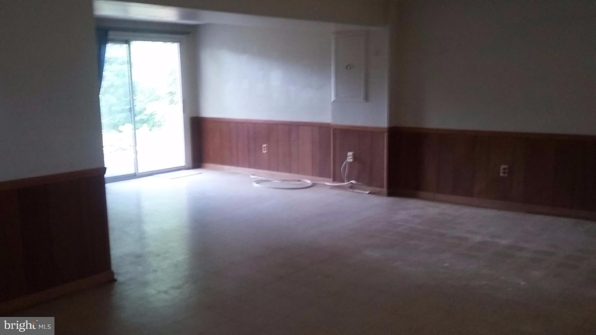 8804 Crandall Road Lanham, MD 20706 - Photo 11 of 11 a view of an empty room and window