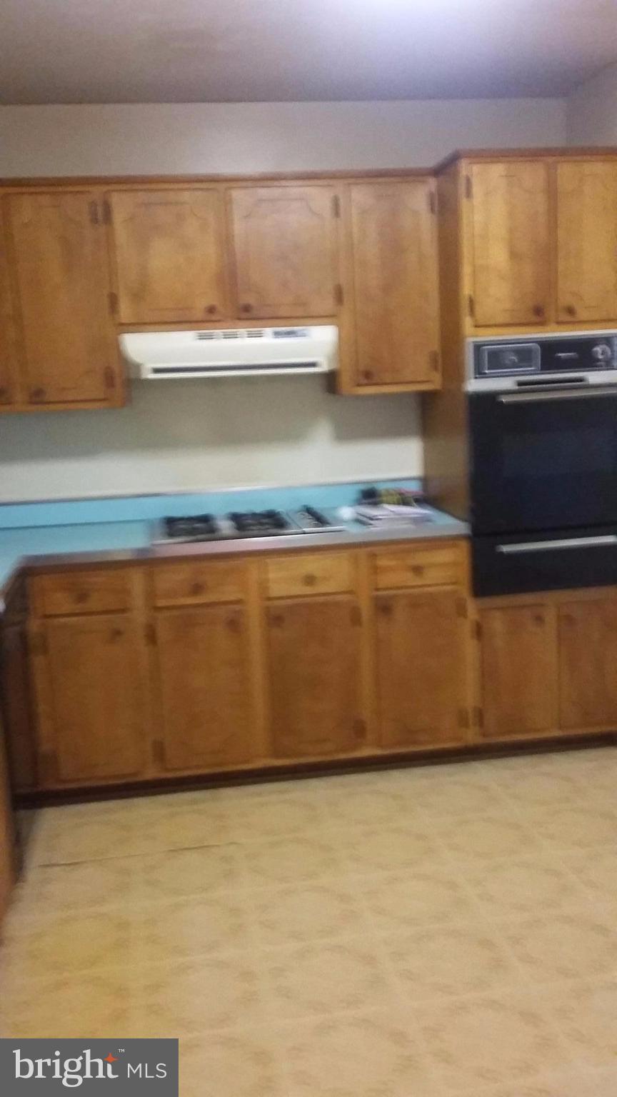 8804 Crandall Road Lanham, MD 20706 - Photo 5 of 11 a view of a kitchen counter top space