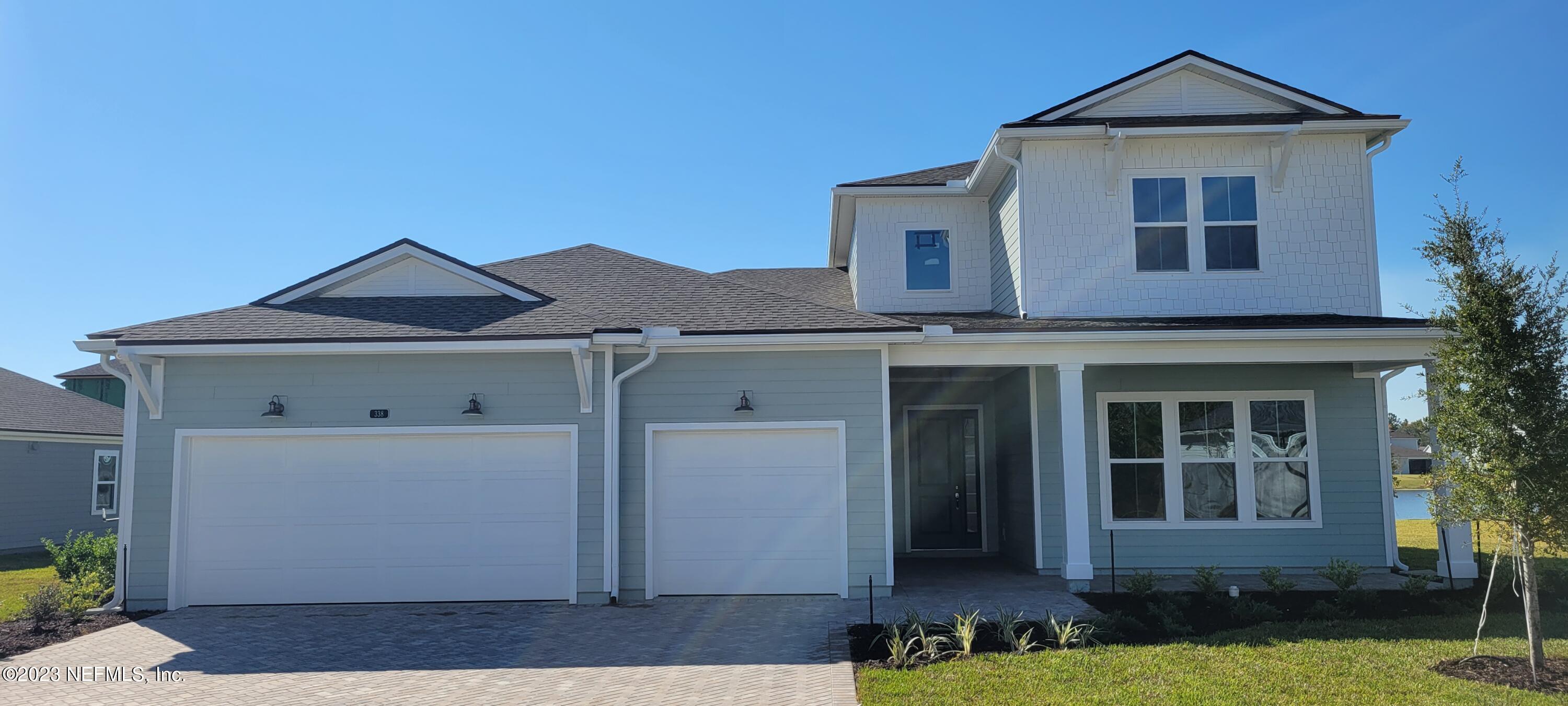 338 Ranch Land Circle St. Johns, FL 32259 - Photo 1 of 23 Spoonbill Coastal w three car garage 2