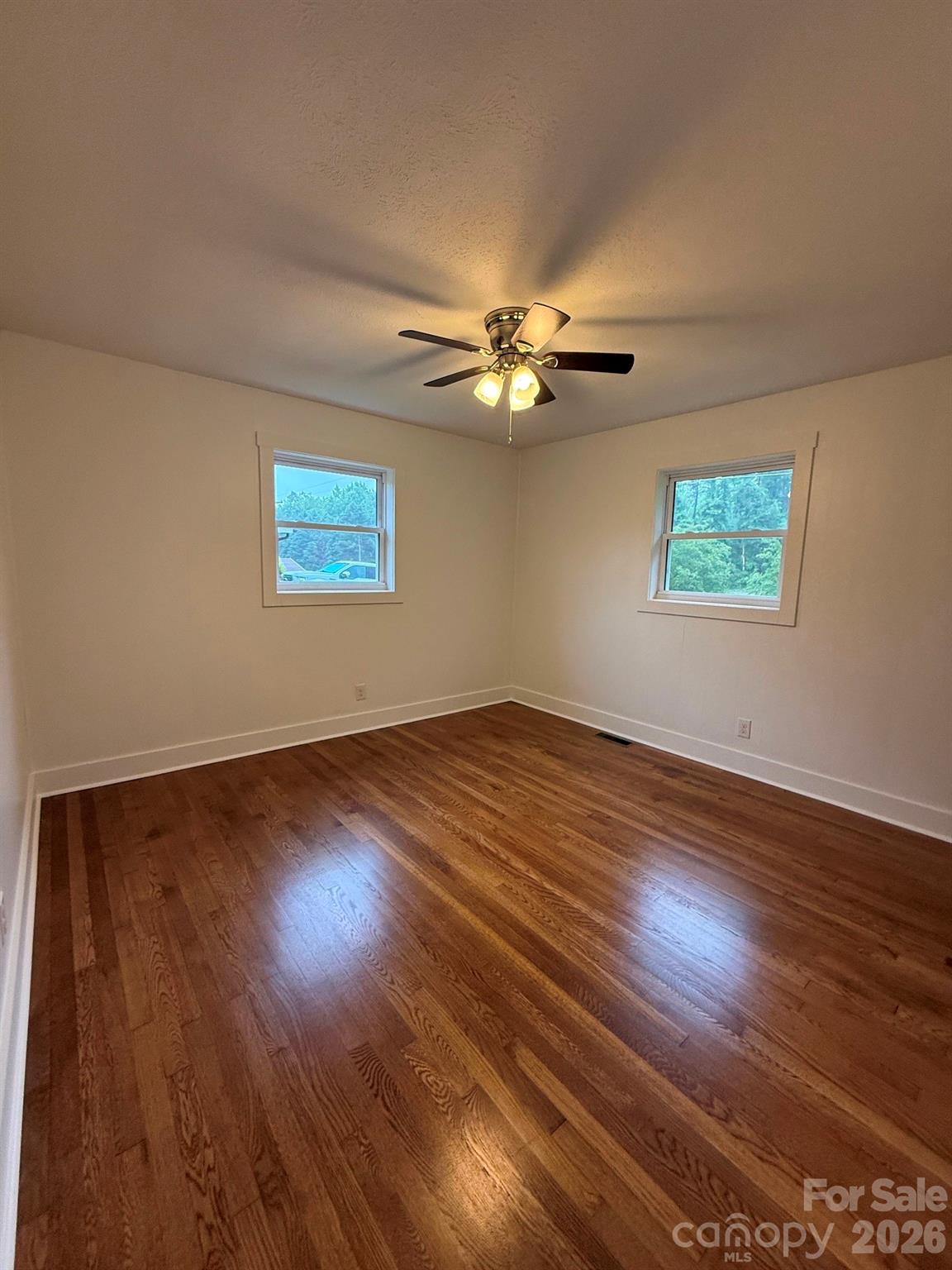 2677 Pax Hill Road Morganton, NC 28655 - Photo 15 of 15 a view of empty room with wooden floor