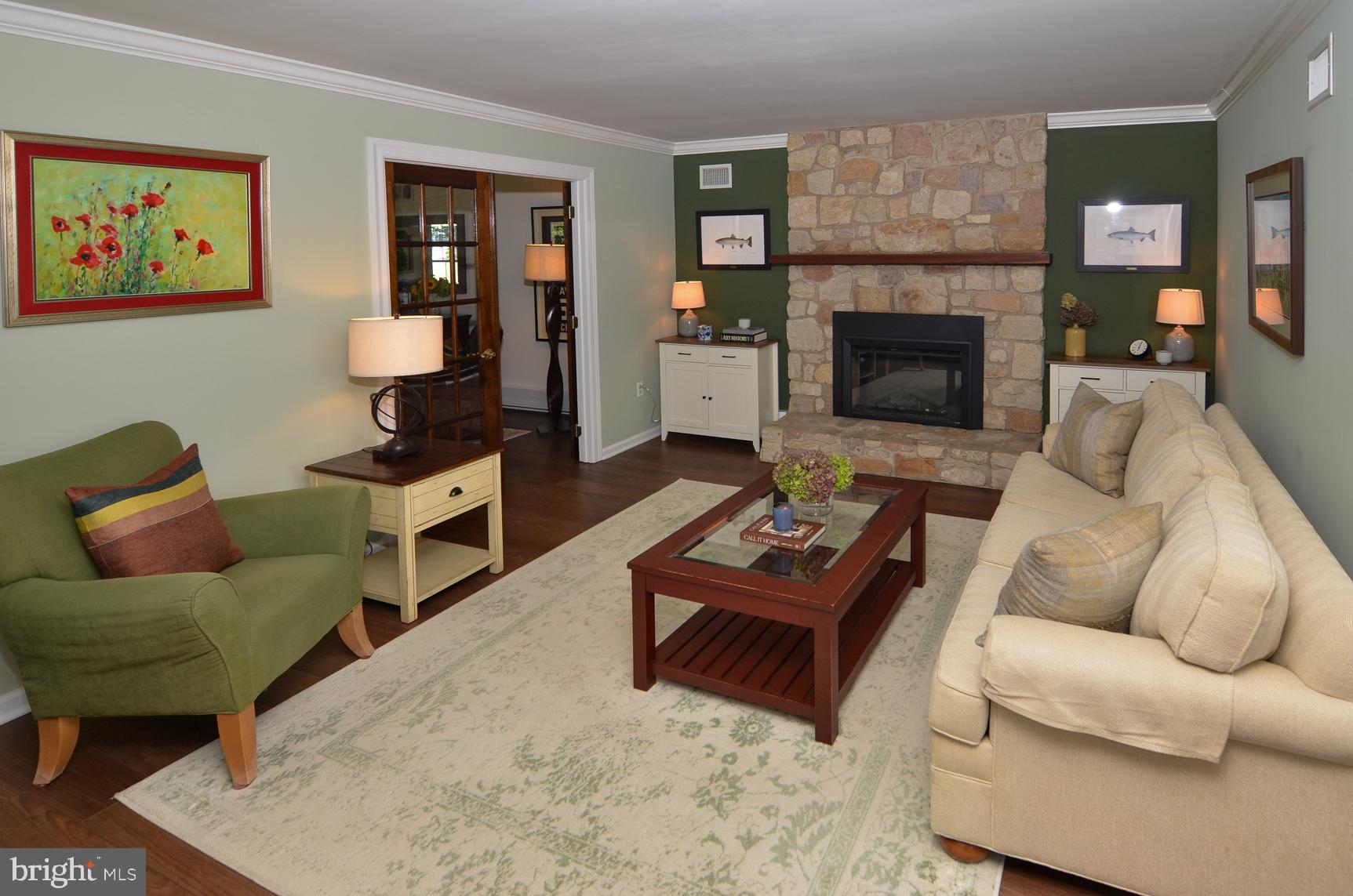 3 Aqua Terrace Hamilton, NJ 08620 - Photo 12 of 39 a living room with furniture and a fireplace