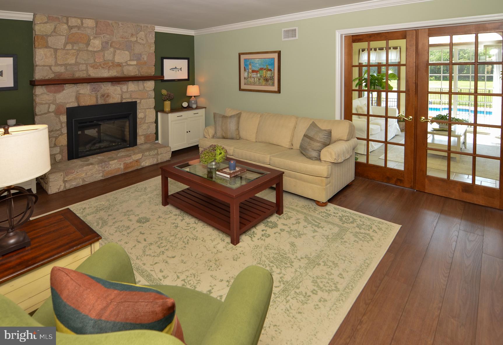 3 Aqua Terrace Hamilton, NJ 08620 - Photo 13 of 39 a living room with furniture and a fireplace