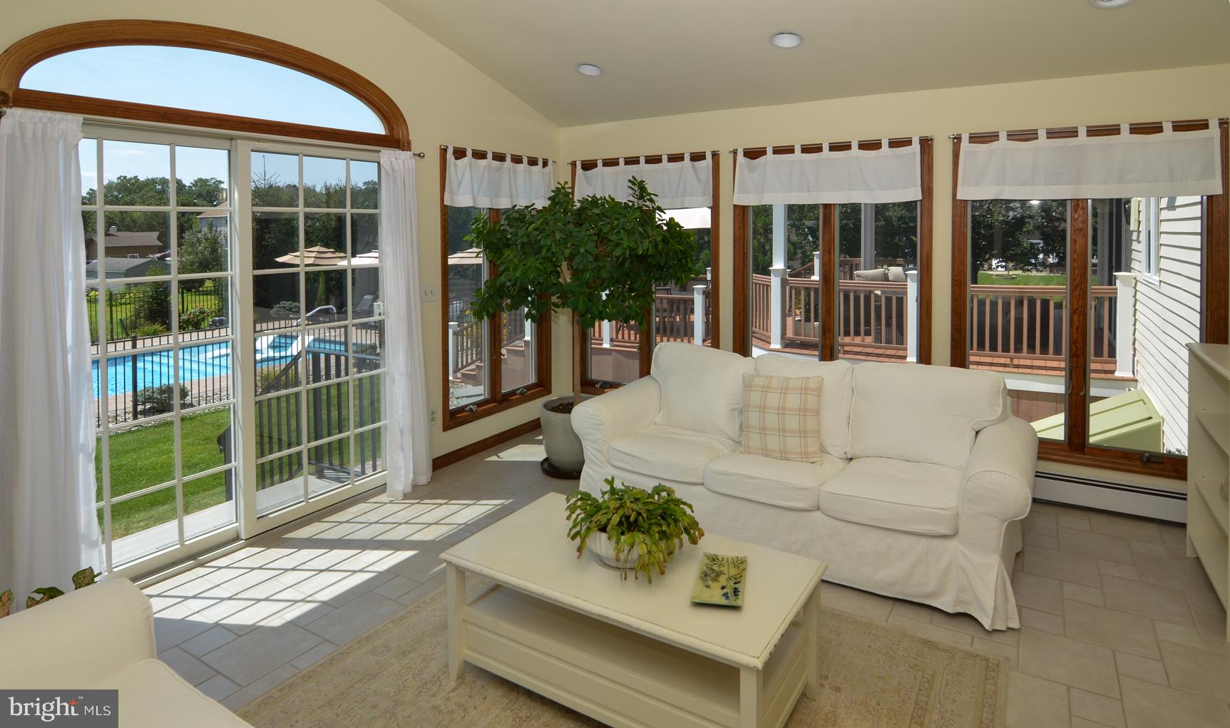 3 Aqua Terrace Hamilton, NJ 08620 - Photo 15 of 39 a living room with furniture and large windows