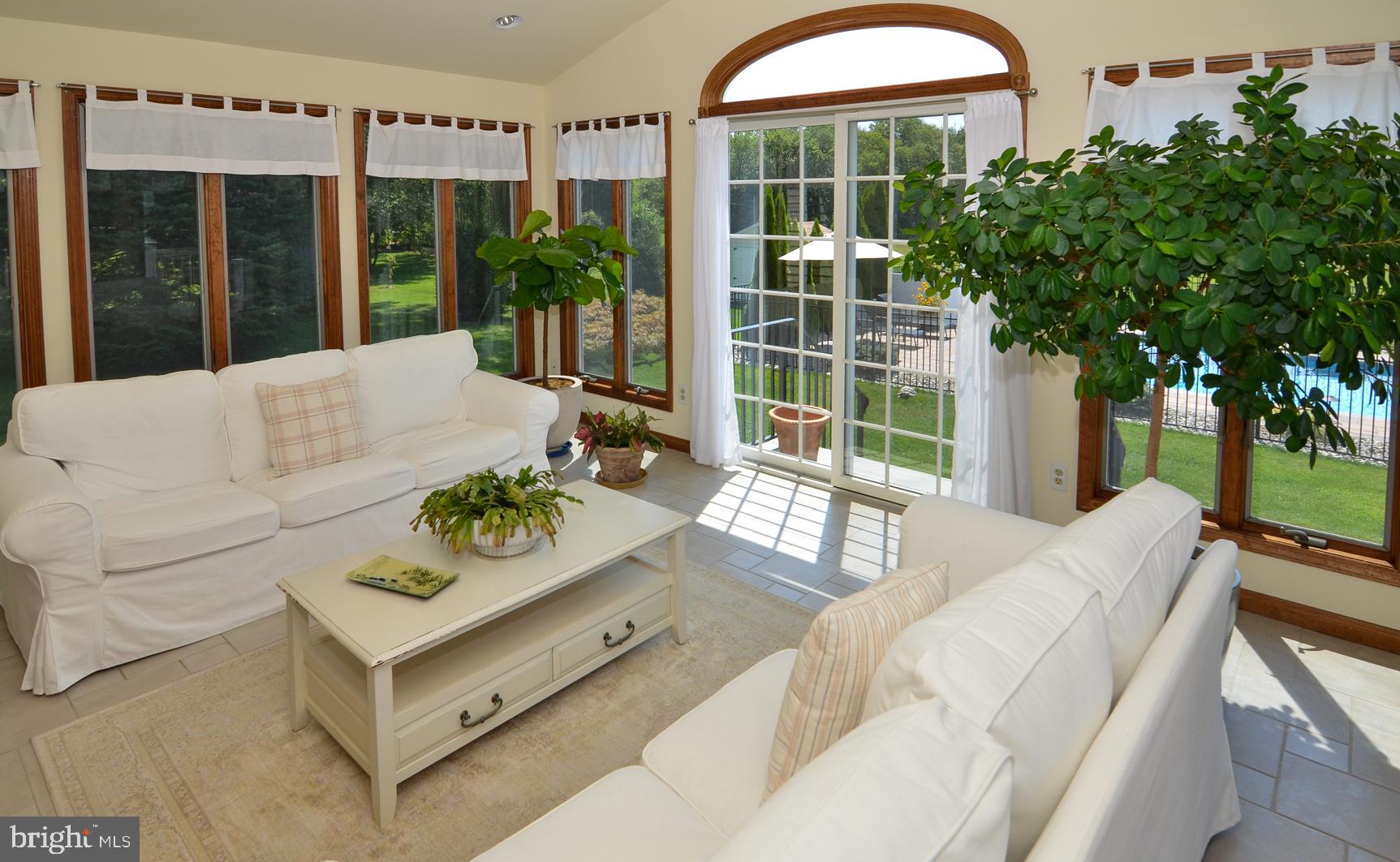 3 Aqua Terrace Hamilton, NJ 08620 - Photo 16 of 39 a living room with furniture and large window