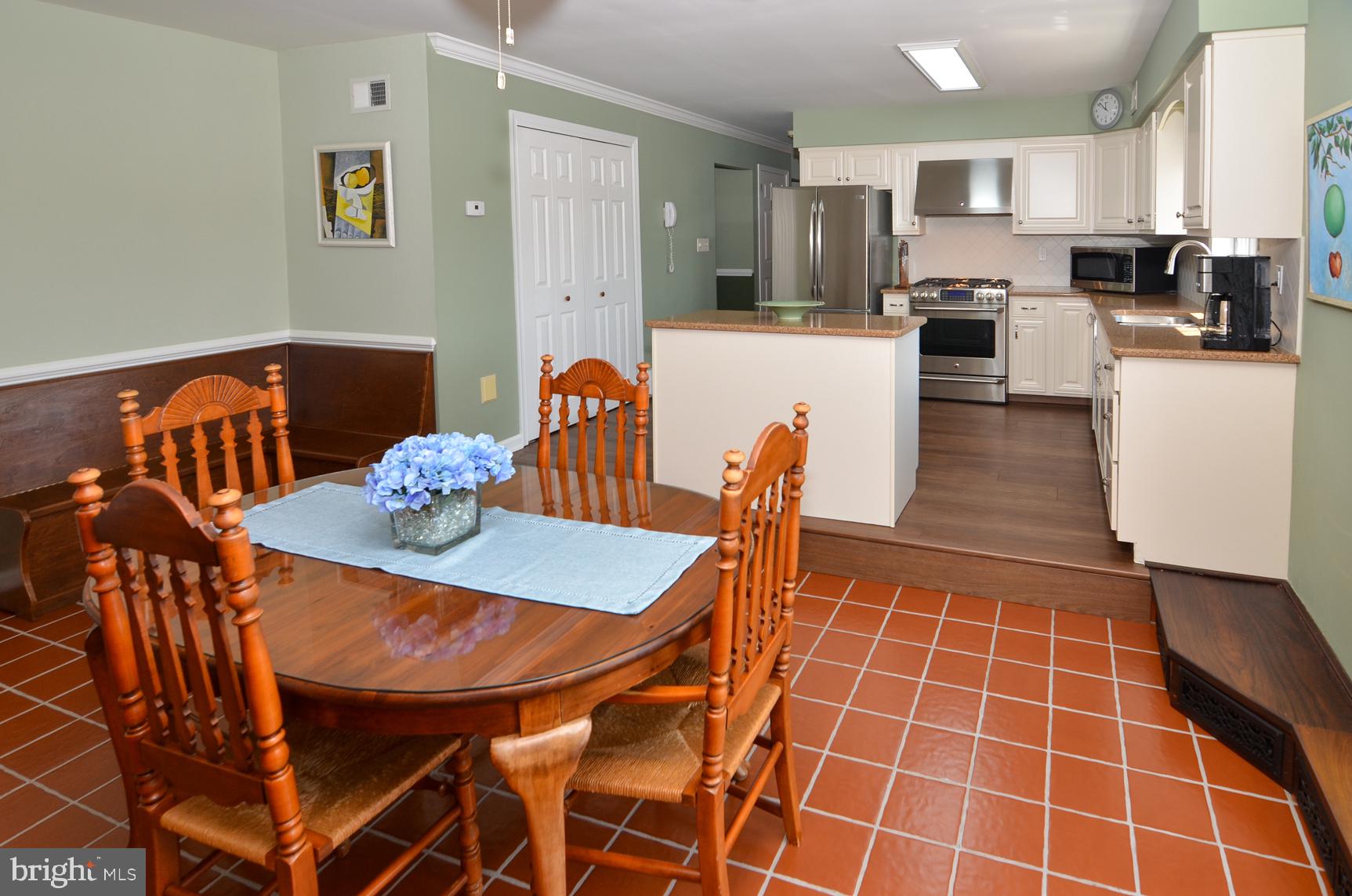 3 Aqua Terrace Hamilton, NJ 08620 - Photo 19 of 39 a view of a dining room with furniture and wooden floor