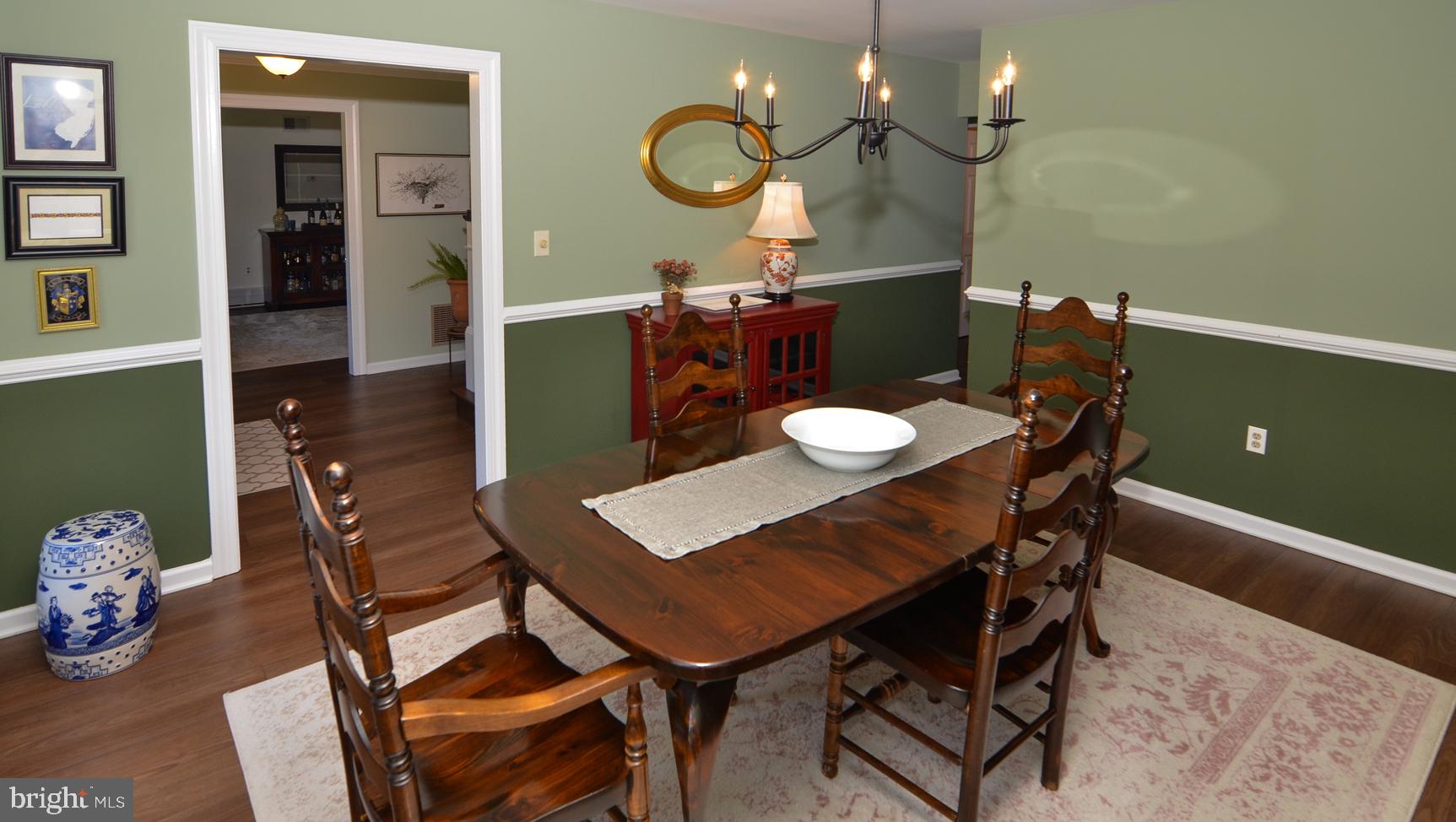 3 Aqua Terrace Hamilton, NJ 08620 - Photo 23 of 39 a view of a dining room with furniture and wooden floor