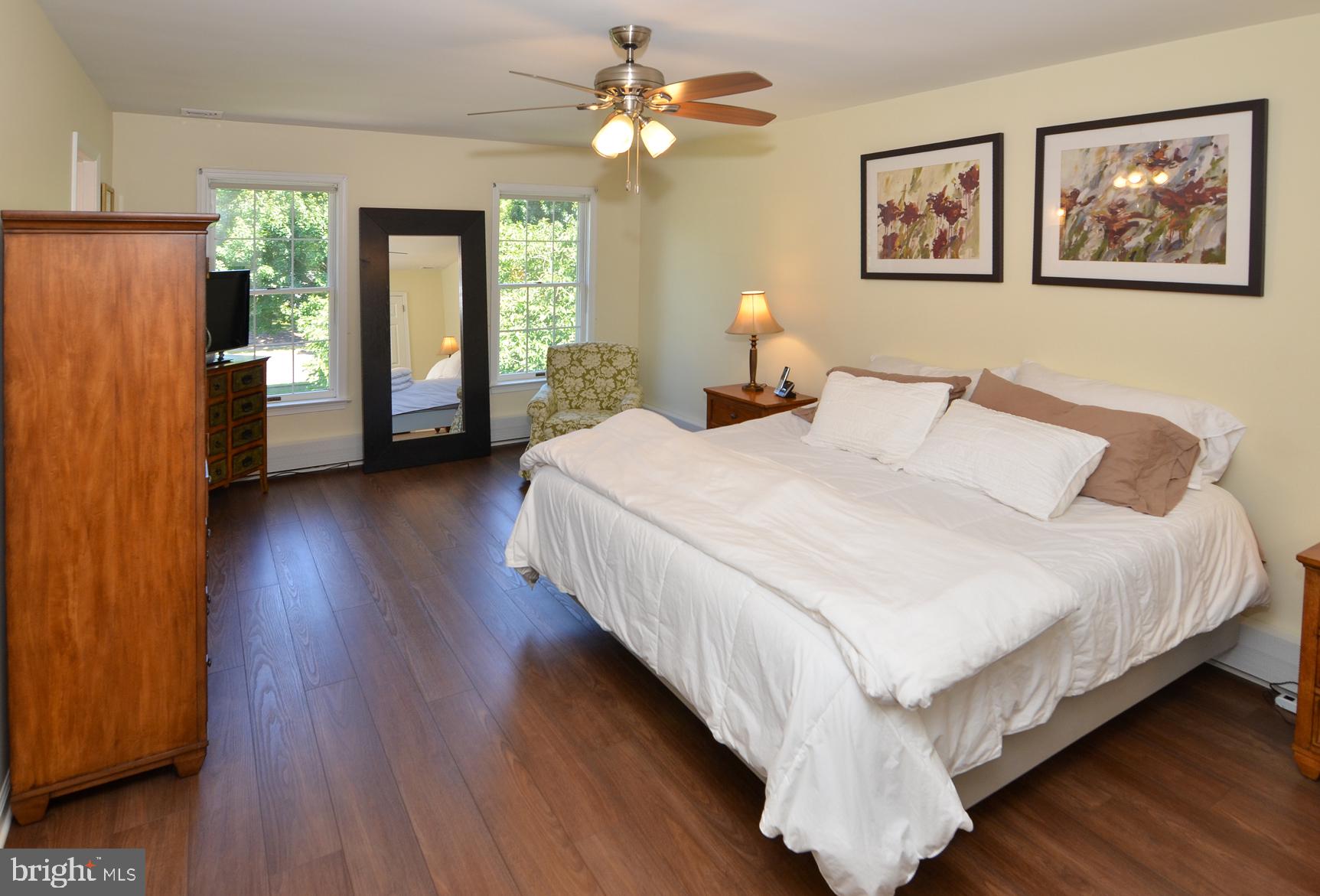 3 Aqua Terrace Hamilton, NJ 08620 - Photo 25 of 39 a bedroom with bed and a chandelier