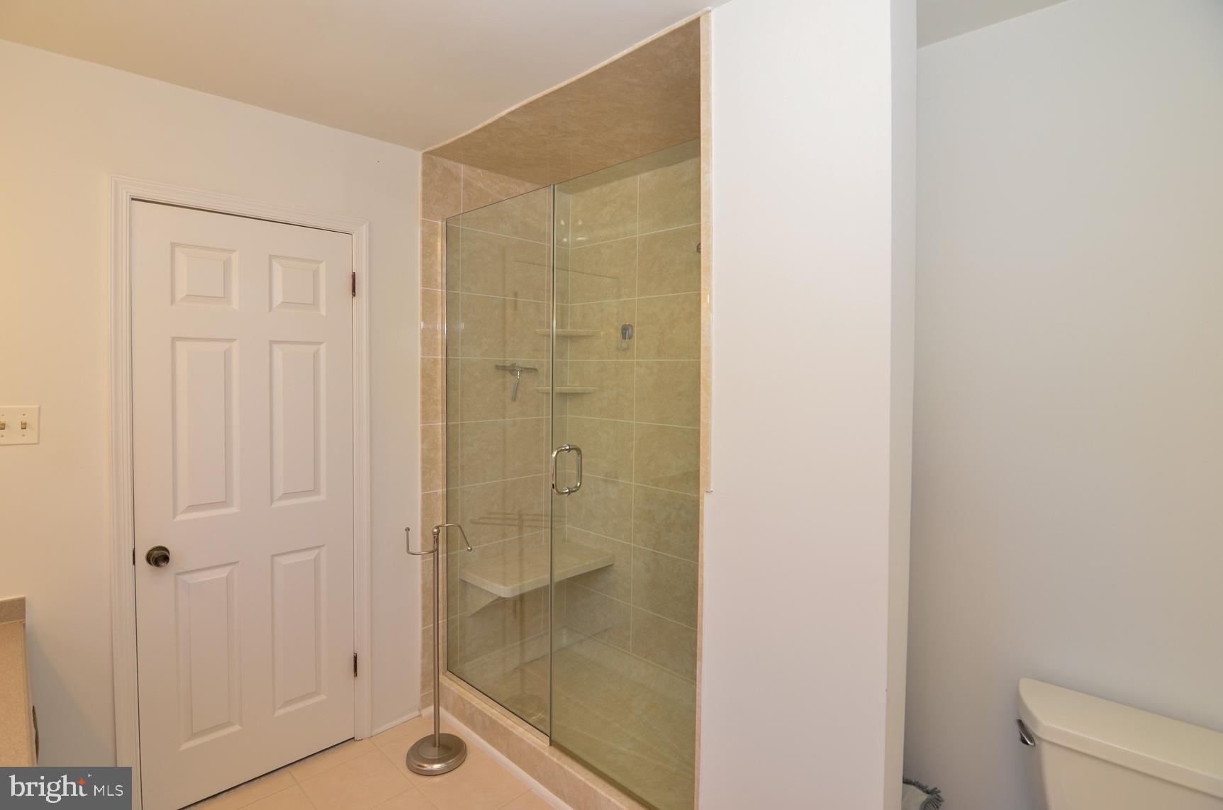 3 Aqua Terrace Hamilton, NJ 08620 - Photo 28 of 39 a bathroom with a glass shower door
