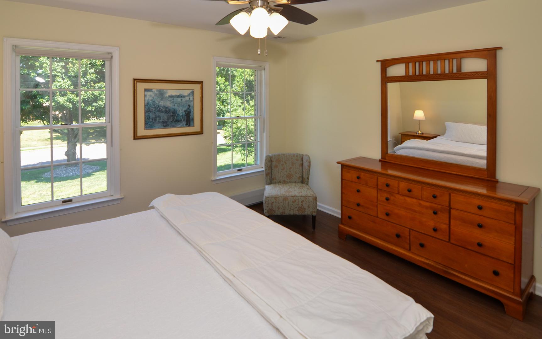 3 Aqua Terrace Hamilton, NJ 08620 - Photo 30 of 39 a bedroom with a bed and a dresser