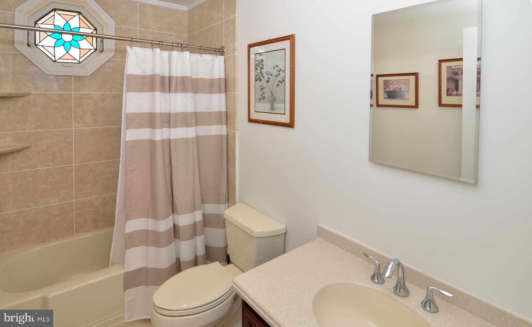 3 Aqua Terrace Hamilton, NJ 08620 - Photo 33 of 39 a bathroom with a toilet a sink and a shower