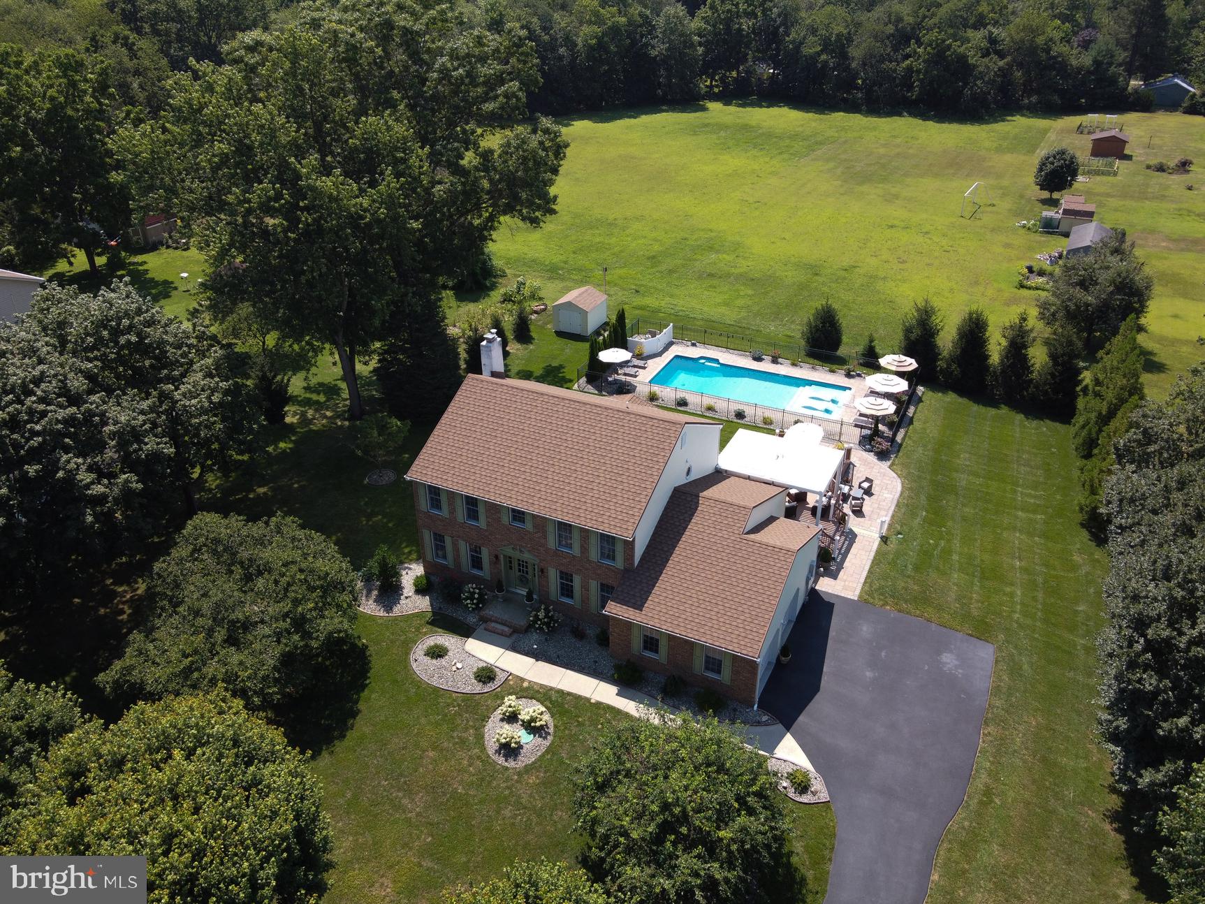 3 Aqua Terrace Hamilton, NJ 08620 - Photo 37 of 39 an aerial view of a house with swimming pool and outdoor seating