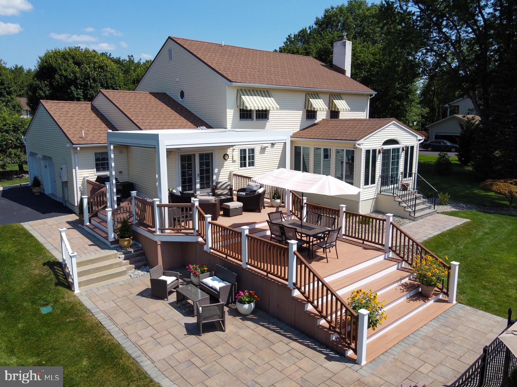 3 Aqua Terrace Hamilton, NJ 08620 - Photo 6 of 39 a view of a patio with couches table and chairs with garden view
