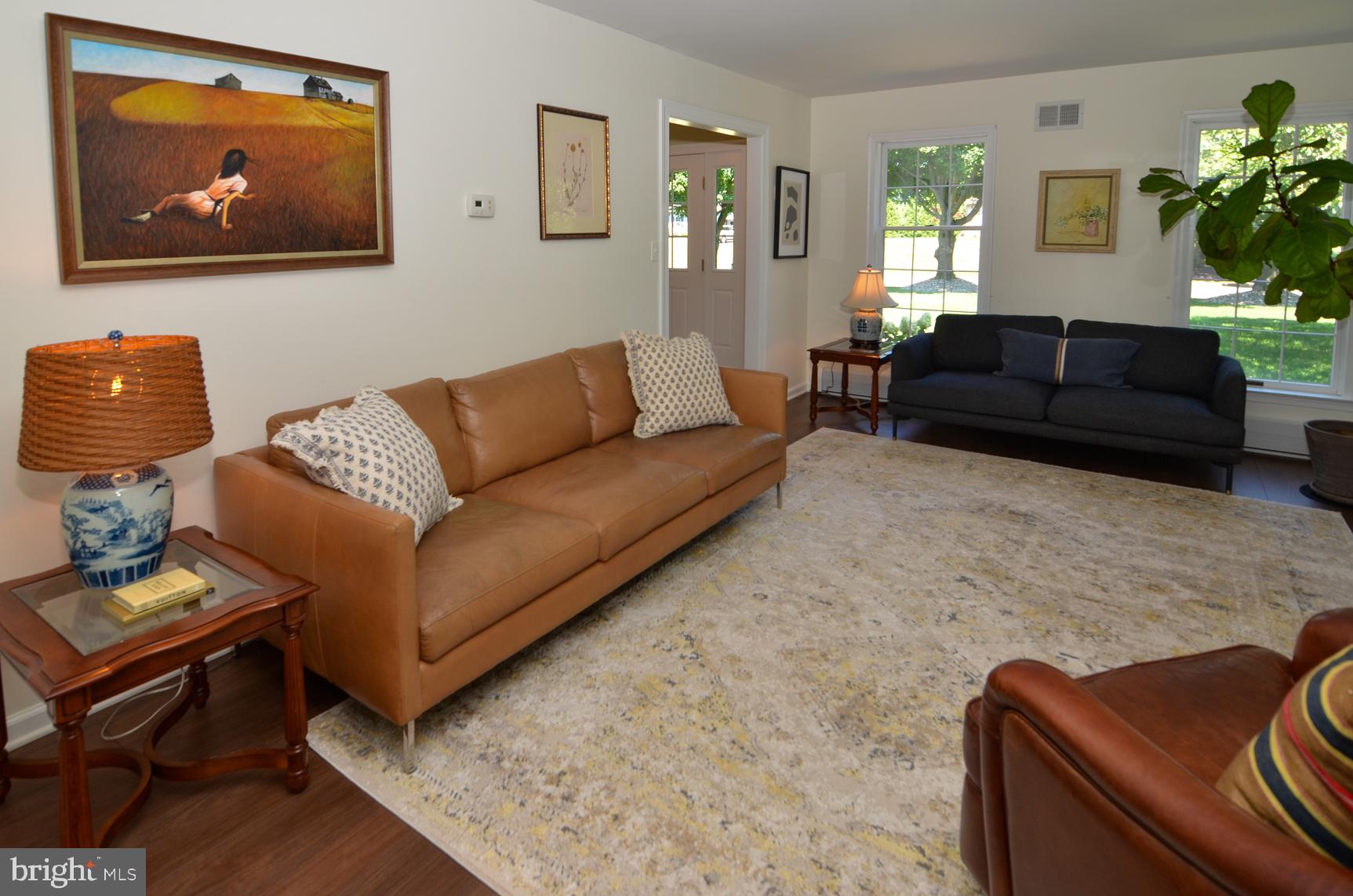 3 Aqua Terrace Hamilton, NJ 08620 - Photo 10 of 39 a living room with furniture and a potted plant