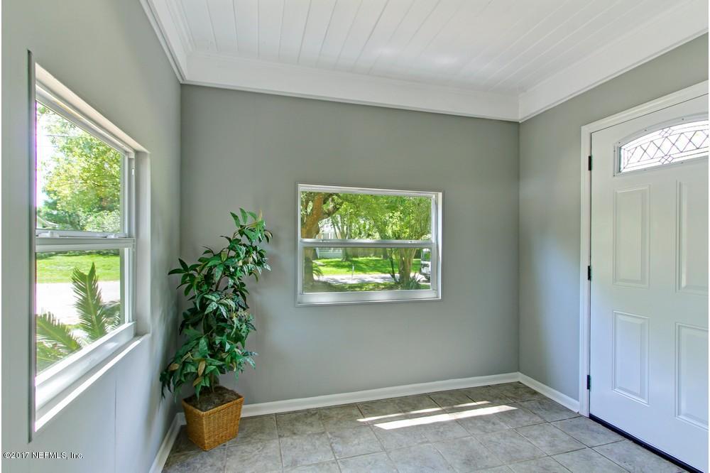 4715 Sunderland Road Jacksonville, FL 32210 - Photo 6 of 26 a view of an empty room with a window