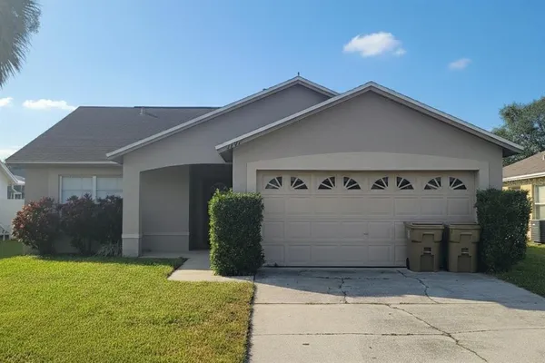 a front view of house with yard