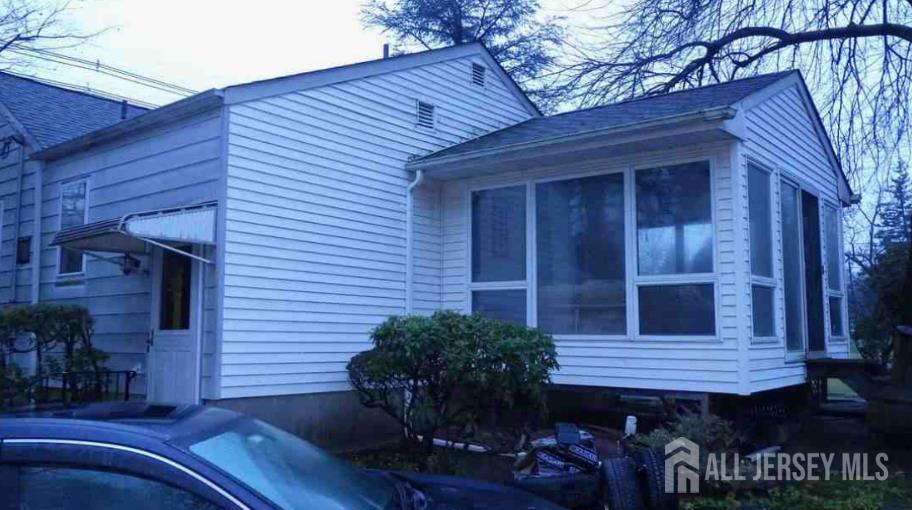 517 Grove Avenue Edison, NJ 08820 - Photo 3 of 5 a house view with a outdoor space