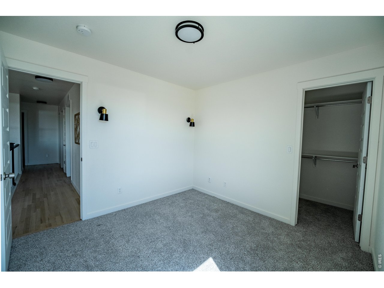 7905 West 11th St Road Greeley, CO 80634 - Photo 26 of 34 Bedroom 2 on upper level, walk-in closet