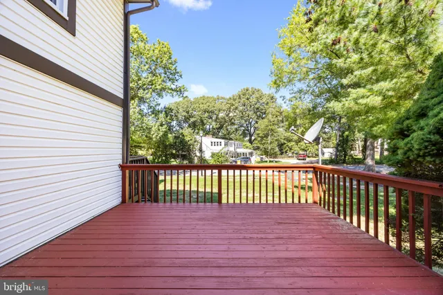 a view of balcony with wooden floor