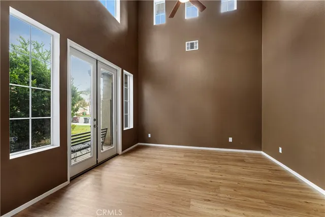 a view of hallway with wooden floor