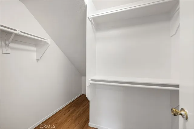 a kitchen with stainless steel appliances granite countertop a stove a sink a microwave and a refrigerator